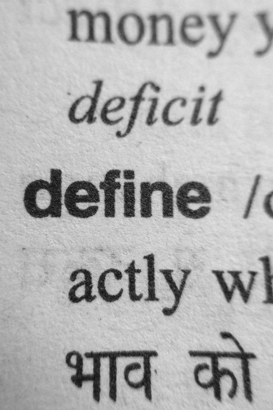 picture of the word "define" in a wordbook